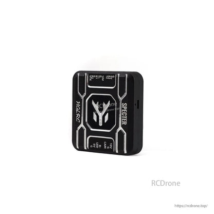 Angled view of SPECTER mini flight controller showing thickness and side cutouts