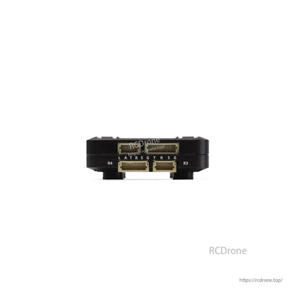 Side profile showing three JST plug ports and labeled pin row on the SPECTER F722 mini flight controller