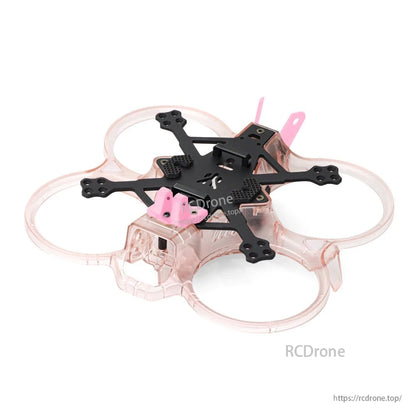 Pink duct guard version of Talon cinewhoop frame showing translucent guards and black carbon top plate