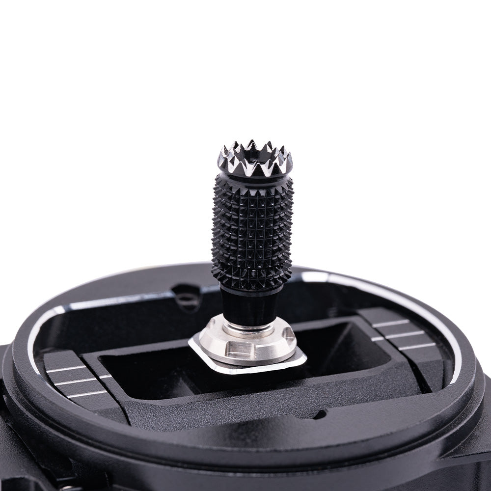 Angled close-up of gimbal stick shaft with textured grip and metal collar mount