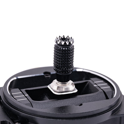 Angled close-up of gimbal stick shaft with textured grip and metal collar mount