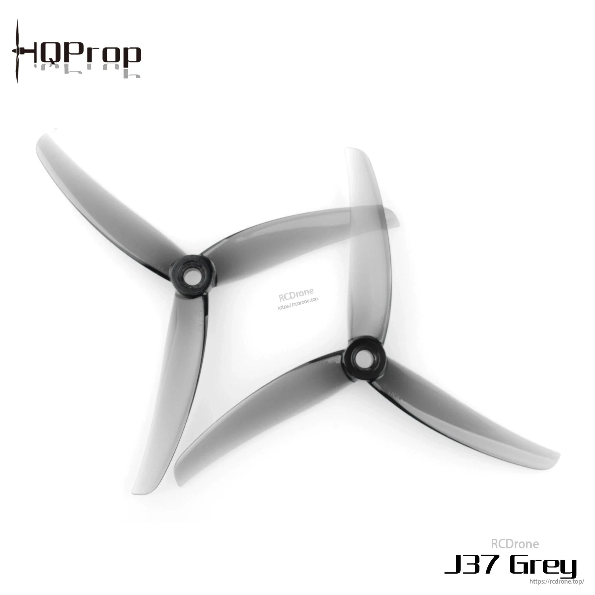 Grey 3-blade FPV drone propellers, two pieces, top view on white background