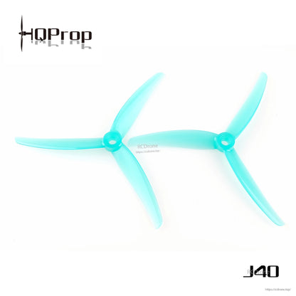 Teal translucent J40 3-blade propellers with 5mm hub opening, pair on white background