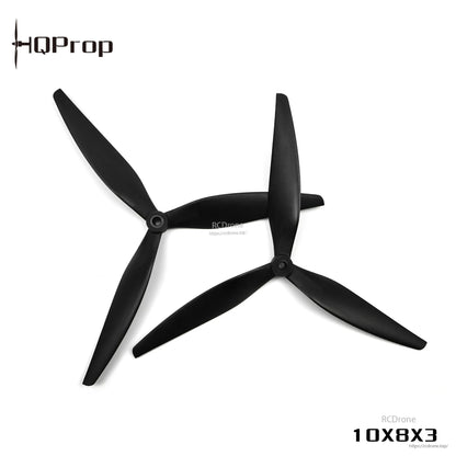 Angled view of HQProp black 10x8x3 tri-blade propellers with printed size label
