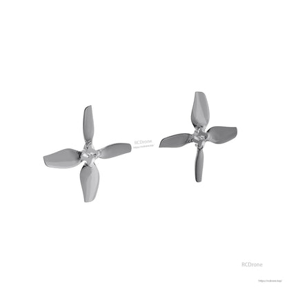 Pair of gray four-blade propellers shown separated, angled orientation to show blade curvature and hub detail