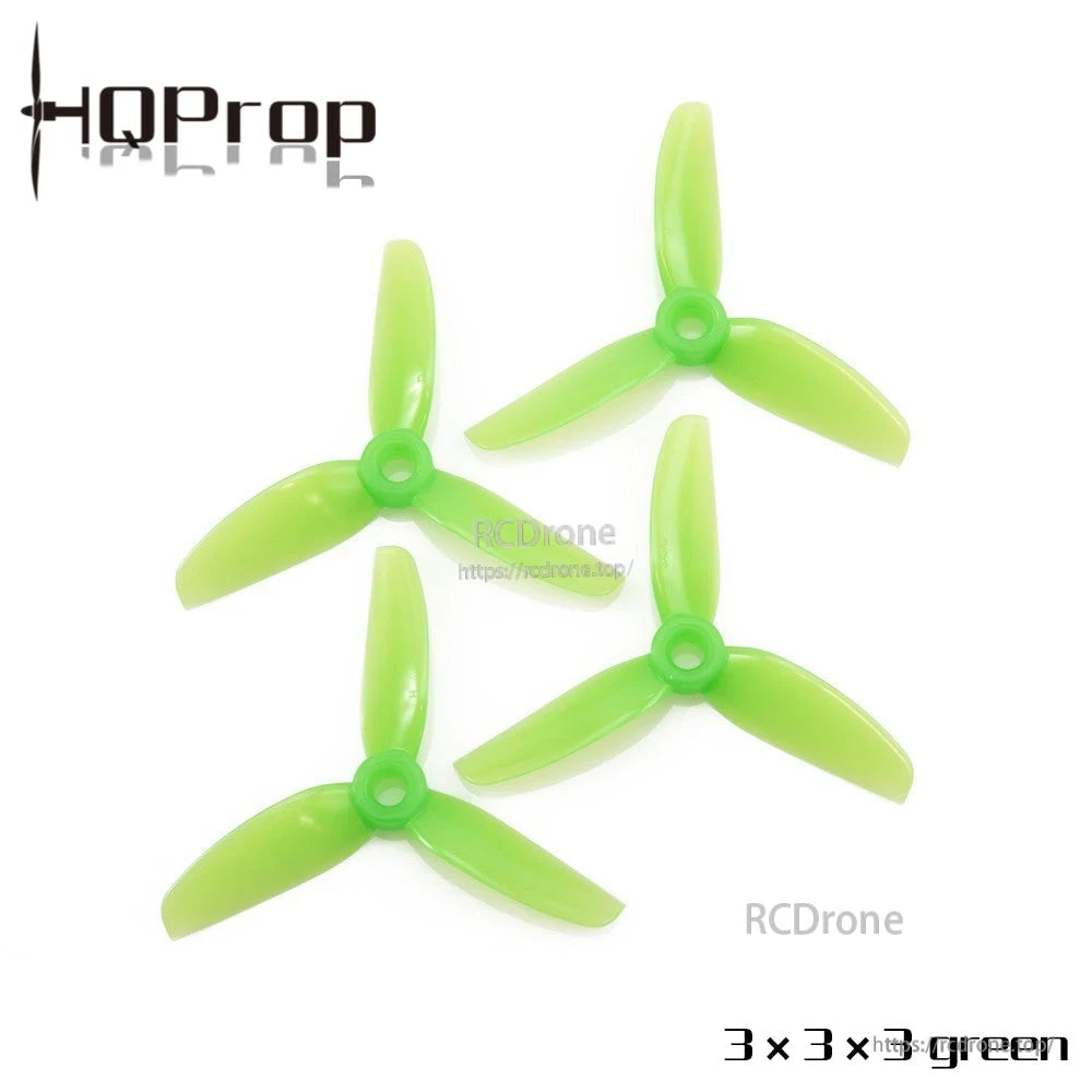 Green 3x3x3 three-blade propeller set, four props displayed on white background