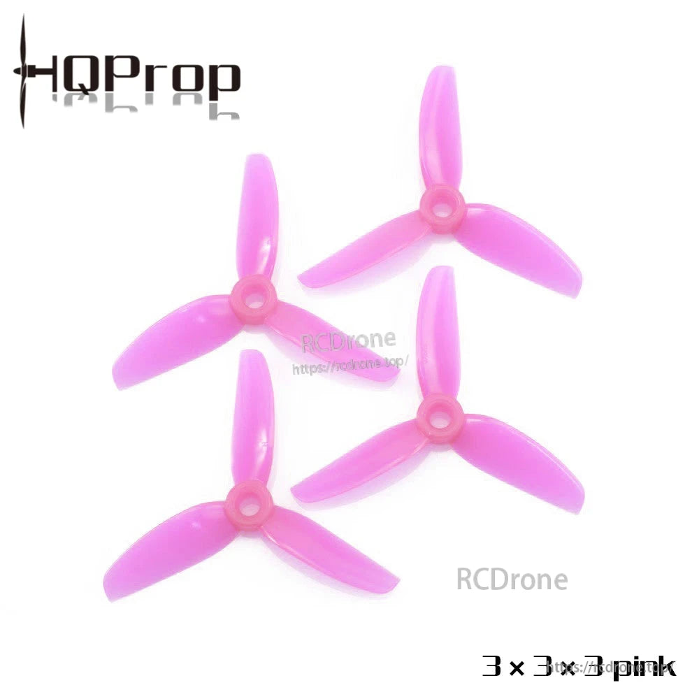 Pink 3x3x3 three-blade propeller set, four props shown top view