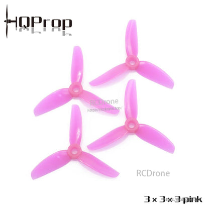 Pink 3x3x3 three-blade propeller set, four props shown top view