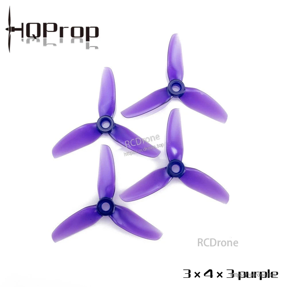 3x4x3 tri-blade propellers set of four in purple, top view of all props arranged on white