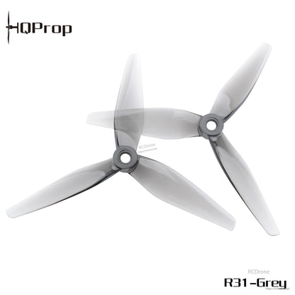 Grey 3-blade propellers set, two props shown overlapping with hub mounting holes