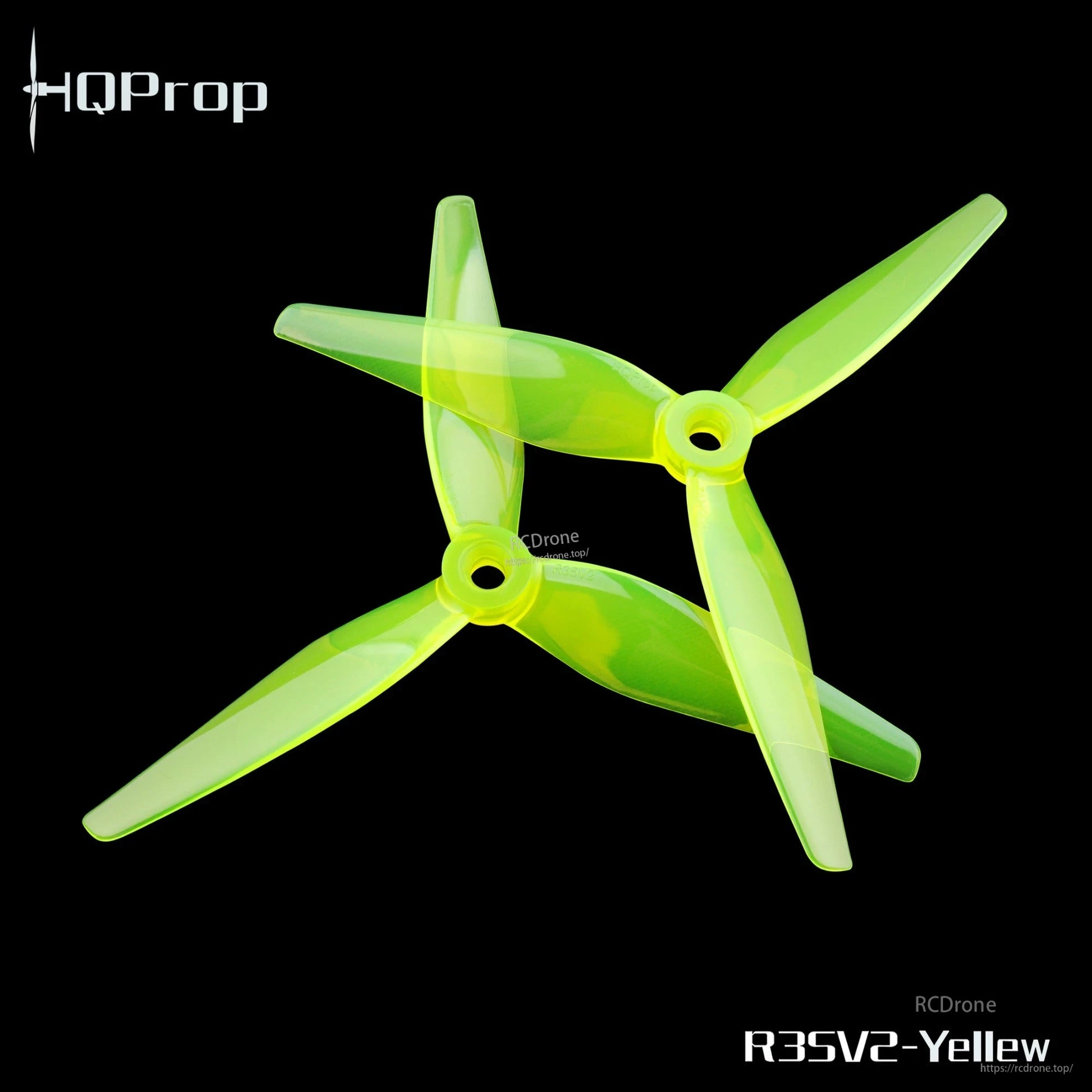 R35V2 yellow 3-blade propeller pair on black background, high-contrast top view