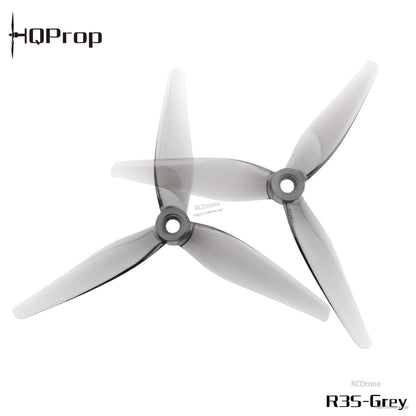 R35V2 grey 3-blade propeller pair, top view showing hub and blade shape