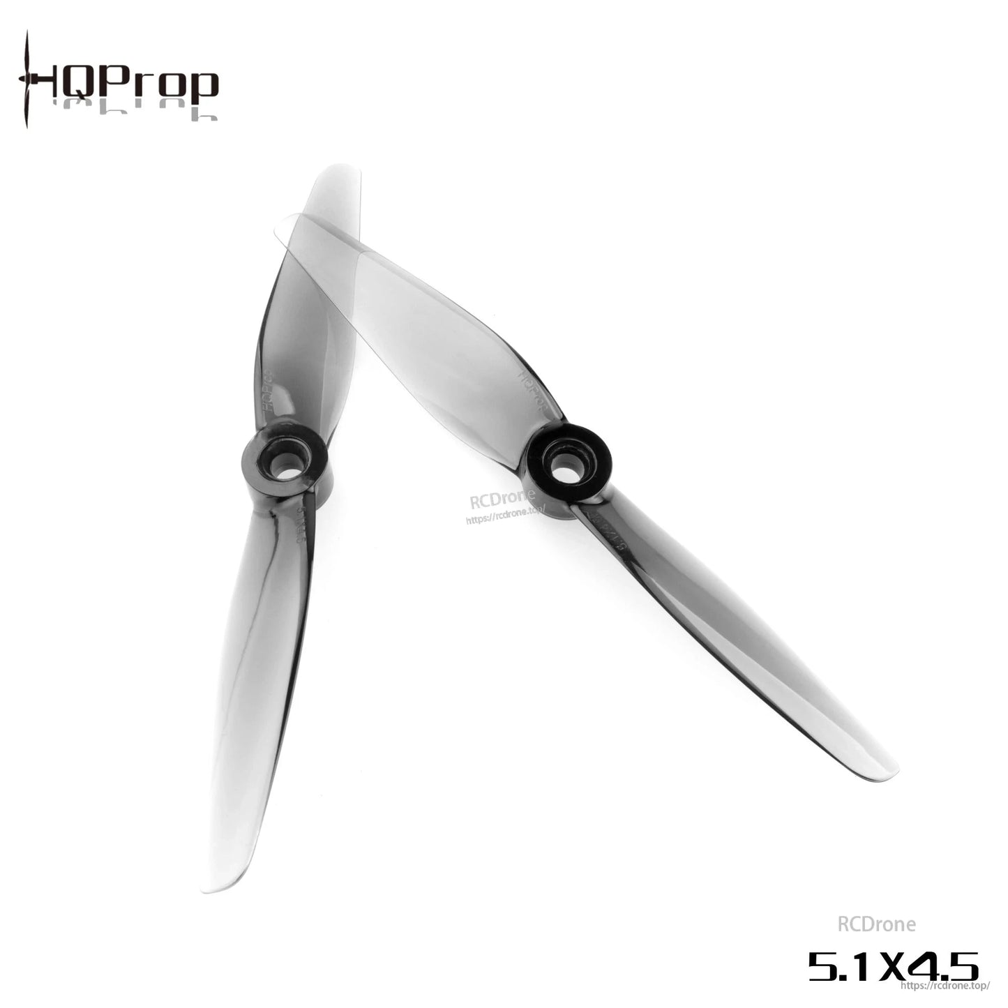 Pair of grey translucent 2-blade drone propellers angled on white, showing curved blades and round hubs