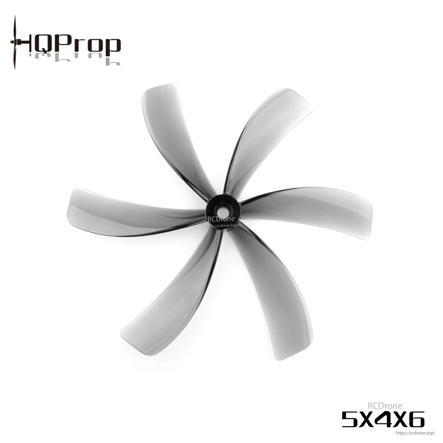 Light grey 5X4X6 6-blade drone propeller close-up, curved blades and central hub detail