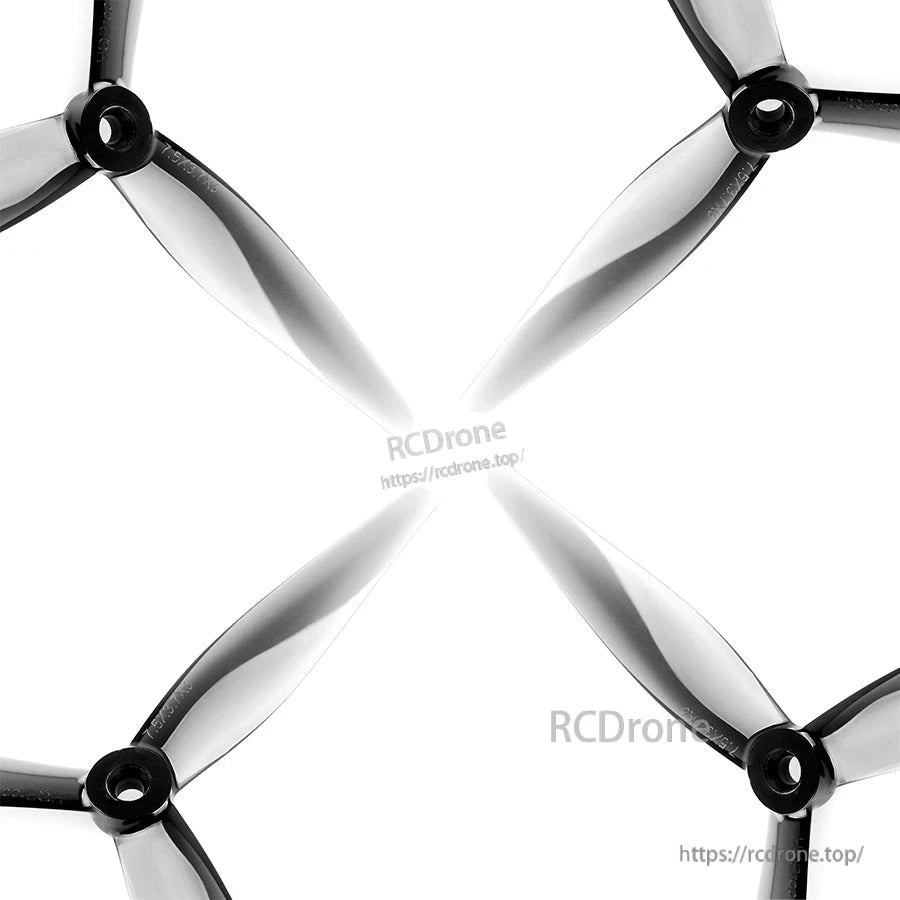 Set of four tri-blade propellers arranged in an X pattern on white background, translucent grey finish