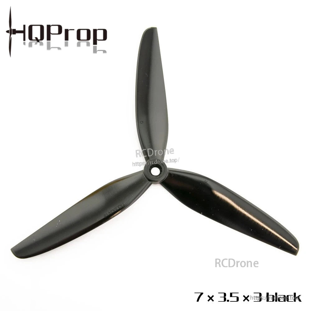 Close view of black 7x3.5x3 tri-blade propeller showing hub opening and blade profile