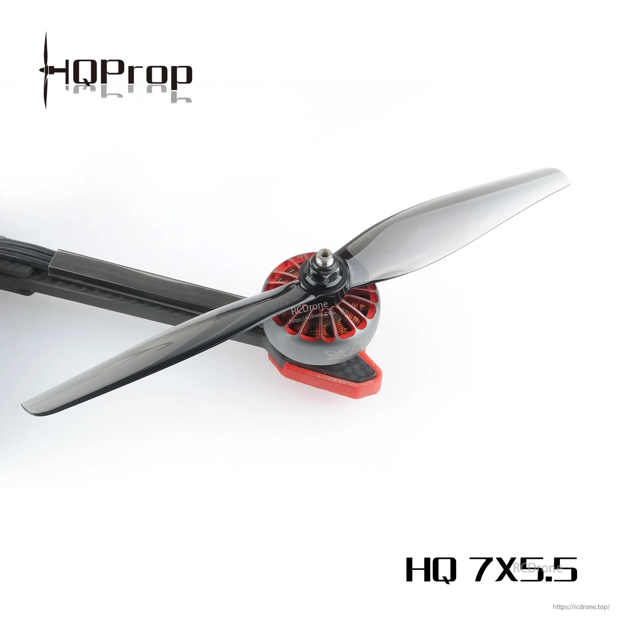 HQProp 7X5.5 light grey polycarbonate 2-blade propeller mounted on a drone motor, HQ 7X5.5 marking
