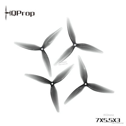Four grey 3-blade drone propellers arranged in a circle with HQProp logo and 7x5.5x3 marking