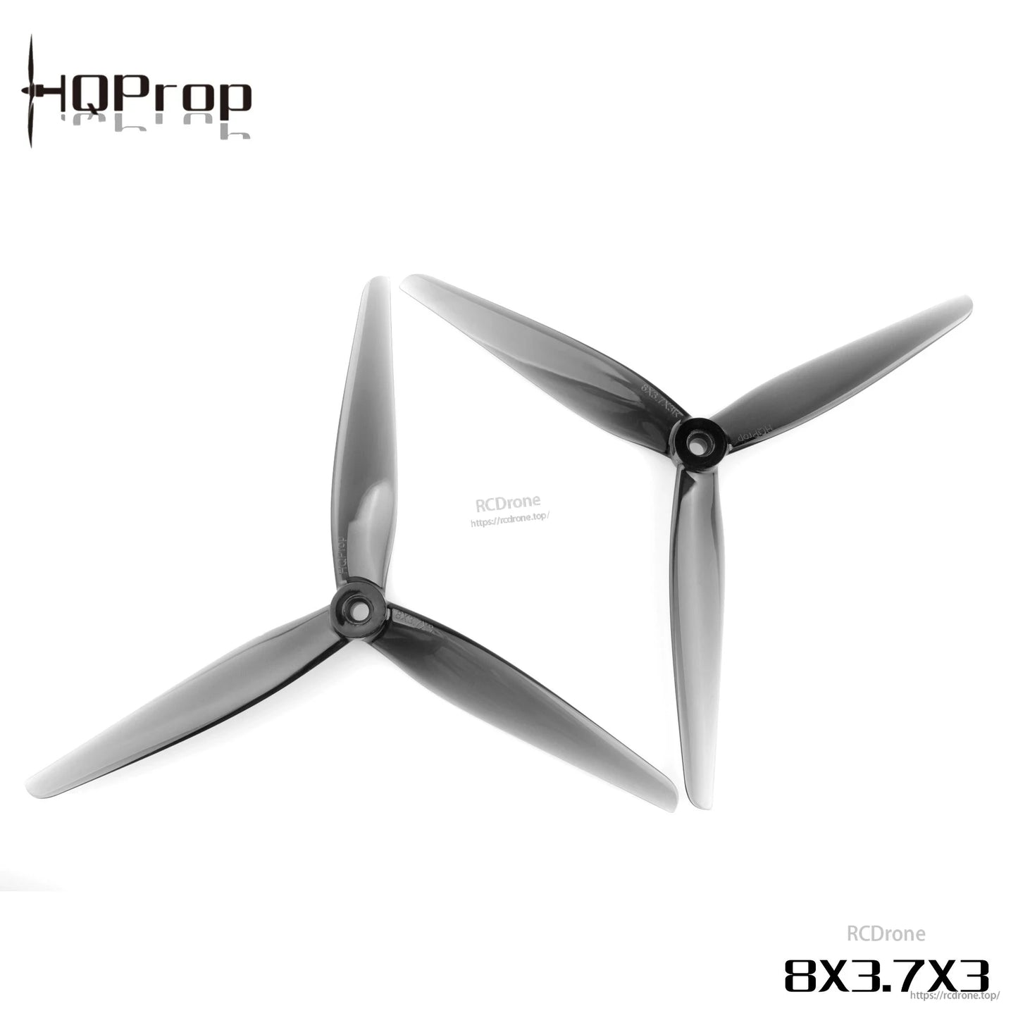 Grey 8x3.7x3 three-blade propeller pair, angled top view showing hub and blade shape