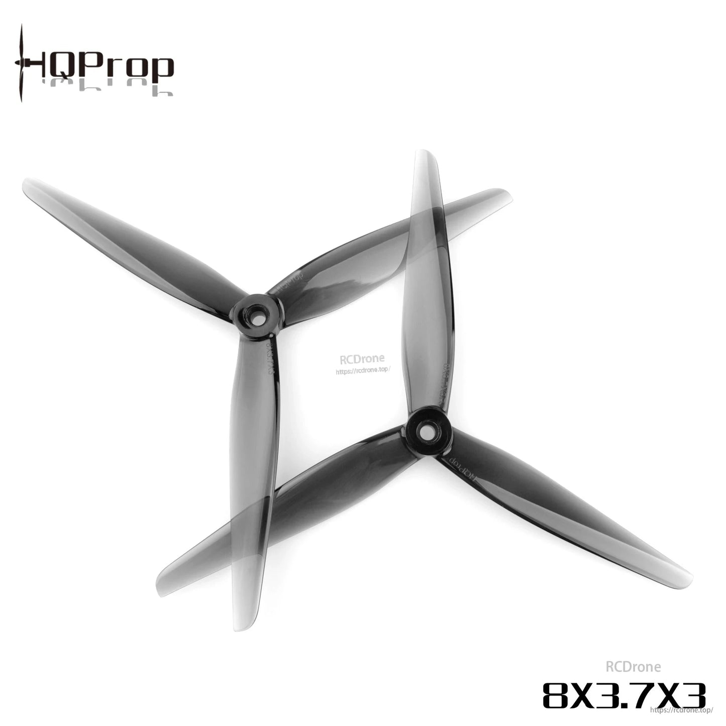 Grey three-blade propellers in crossed layout, close view of center hubs and blade curvature