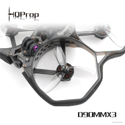 HQProp D90MMX3 propeller installed on a ducted cinewhoop frame, close-up of motor and guard