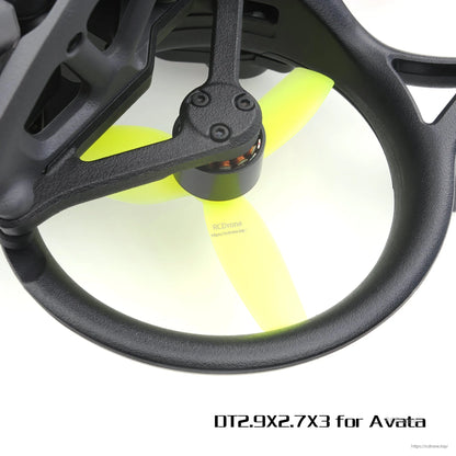 Detail close-up of yellow 3-blade propeller on motor inside duct guard, “DT2.9X2.7X3 for Avata”