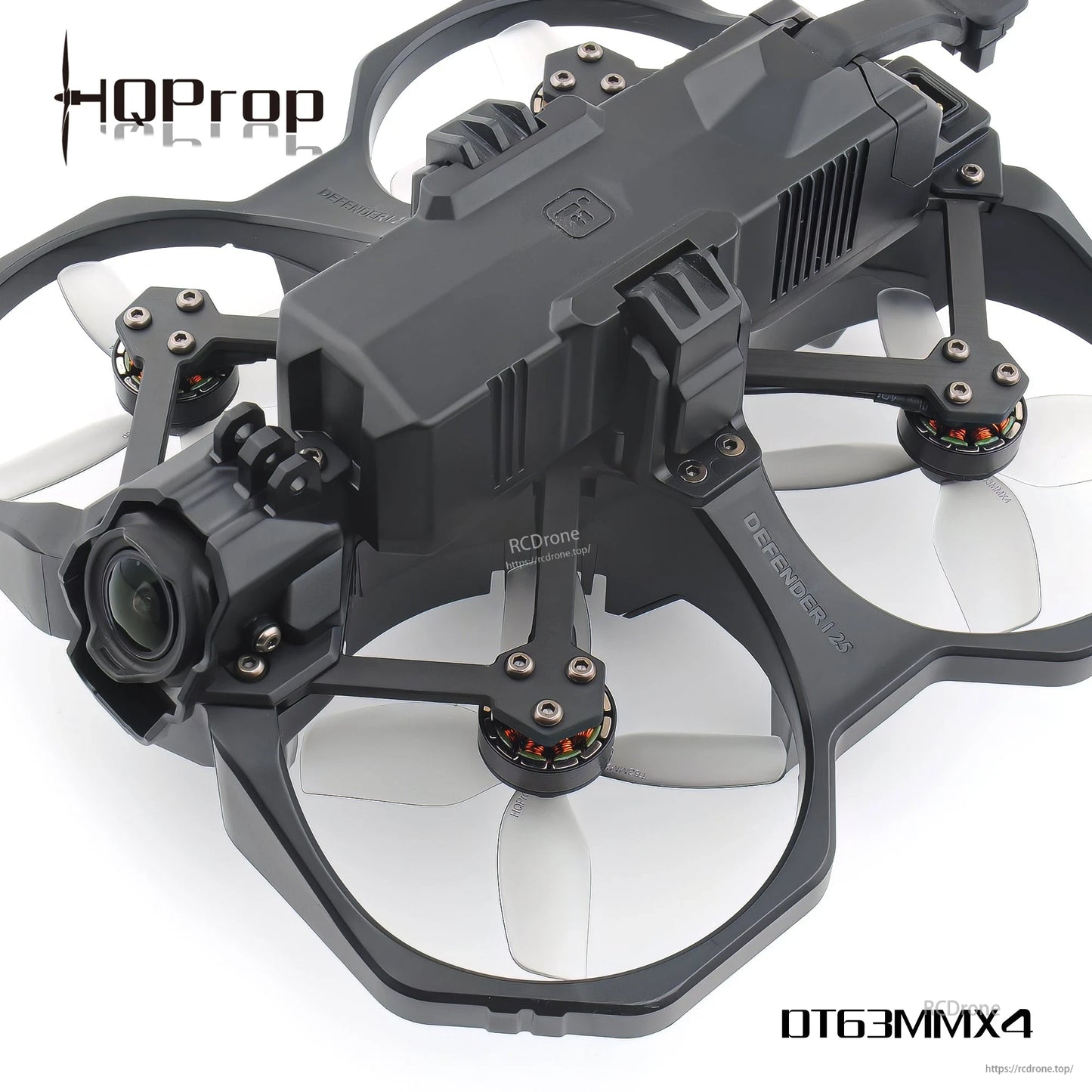 Ducted FPV drone angled view showing multiple light grey 4-blade props mounted on motors