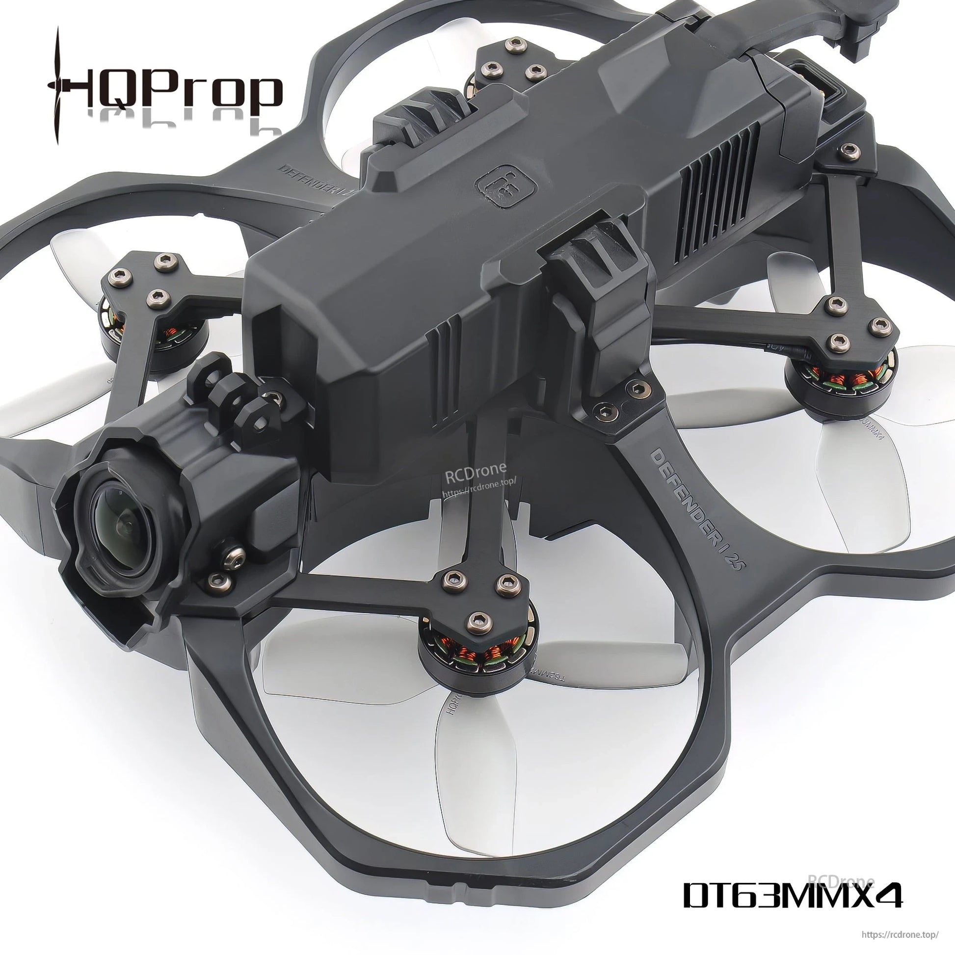 Ducted FPV drone angled view showing multiple light grey 4-blade props mounted on motors