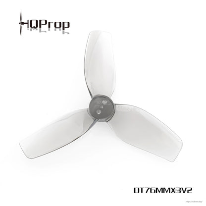 Single smoke gray 76mm tri-blade cinewhoop propeller, top view showing hub and blade profile