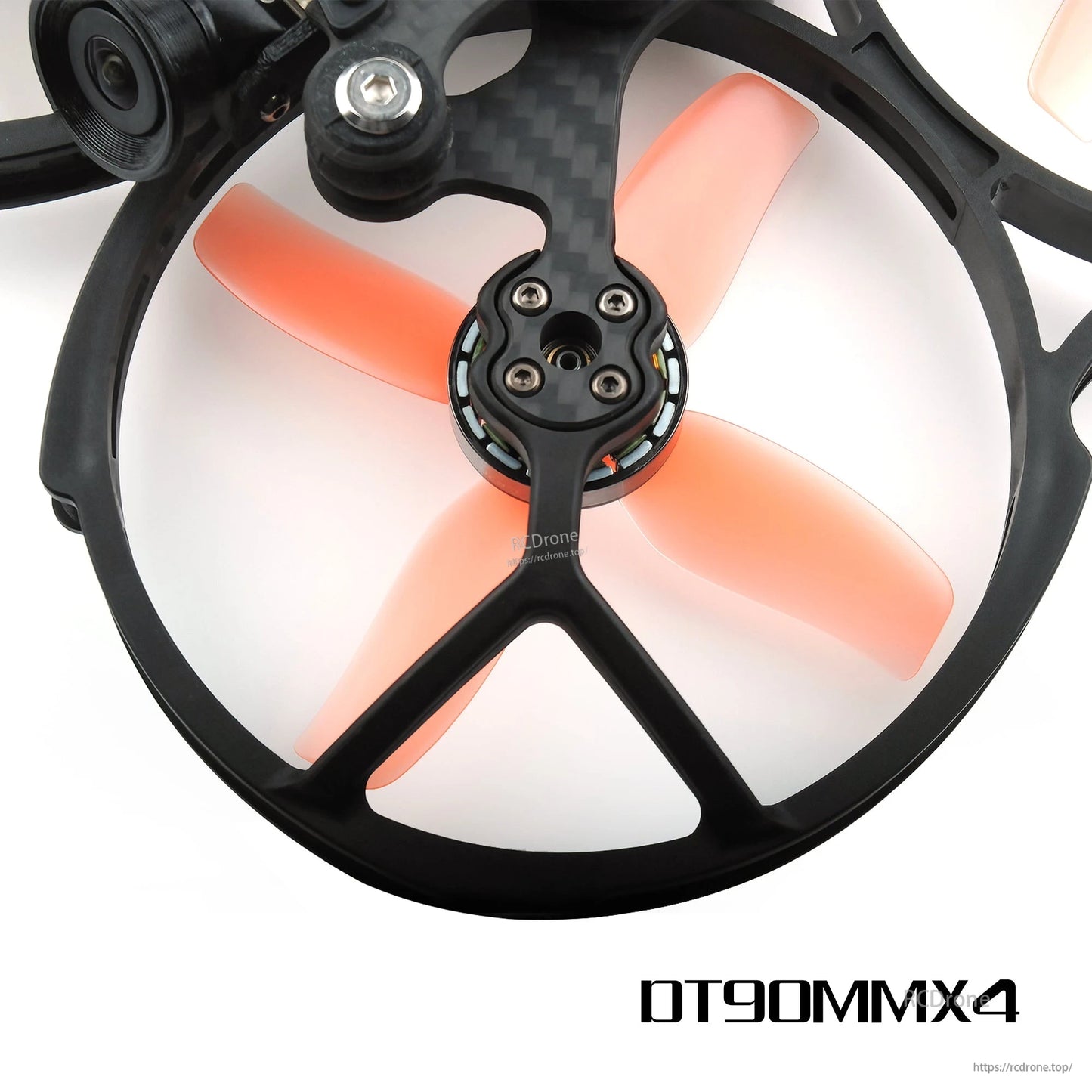 Orange 4-blade prop fitted in ducted cinewhoop frame with camera visible, top-down close-up