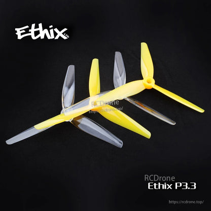 ETHIX P3.3 Mango Lassi tri-blade propellers in yellow and transparent polycarbonate on black background