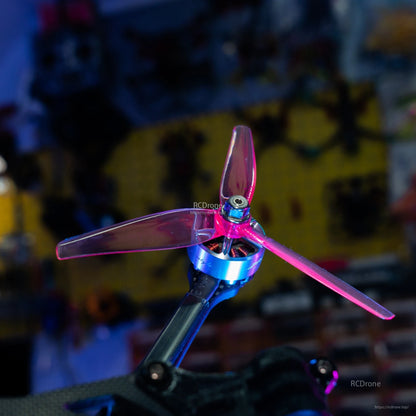 HQProp Ethix P3.5 RAD Berry tri-blade prop mounted on FPV motor, close-up of hub and blades