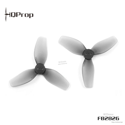 Close-up of two grey tri-blade propellers showing hub details and blade shape, model FB2826