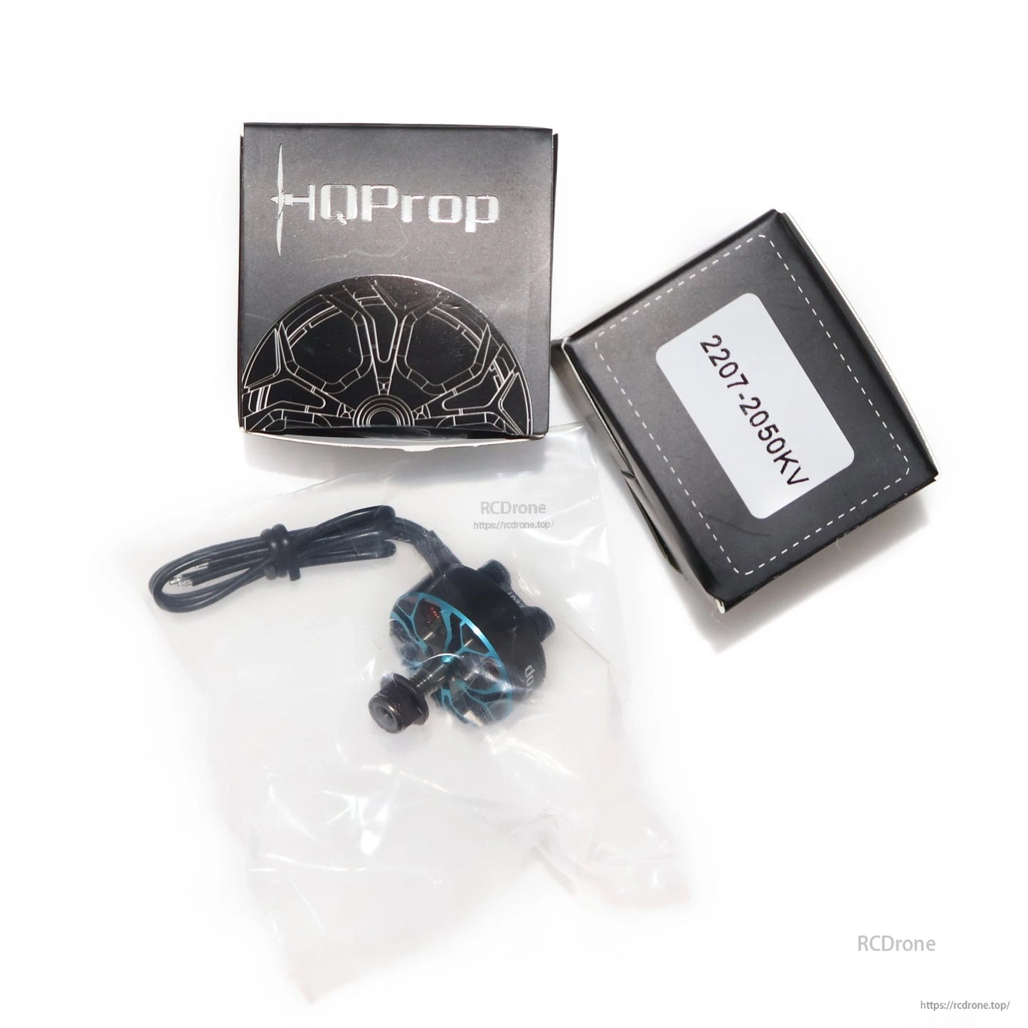 HQProp Flux 2207-2050KV box label with motor and wire lead packed in plastic bag