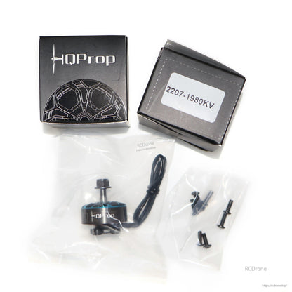 HQProp Flux 2207-1980KV packaging with motor, wire lead, and mounting screws in bags