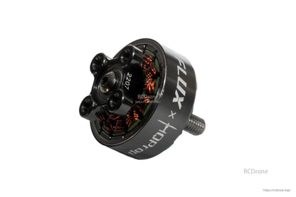 Bottom view of Flux 2207 motor showing mounting pattern, rotor base, and copper windings