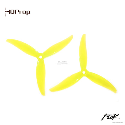 Bright yellow 3-blade drone propellers, pair shown top view on white background