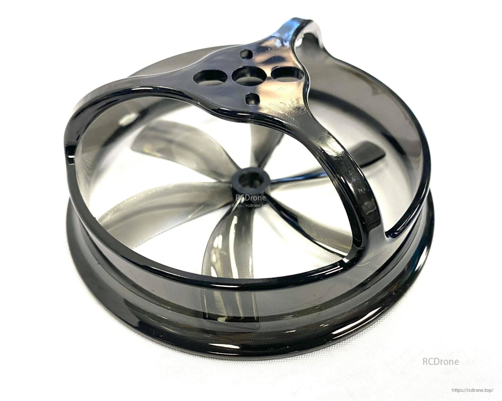 Black polycarbonate duct ring close-up with 6-blade prop visible inside, top mounting plate detail