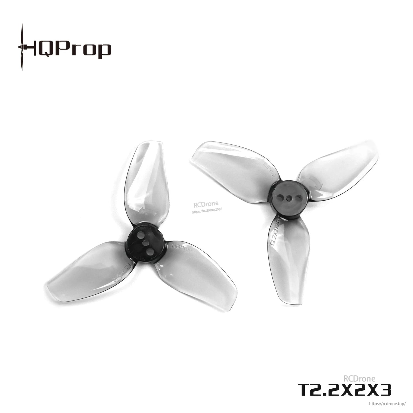 Close-up of pair of grey tri-blade drone propellers showing center hub and mounting holes (T2.2X2X3)
