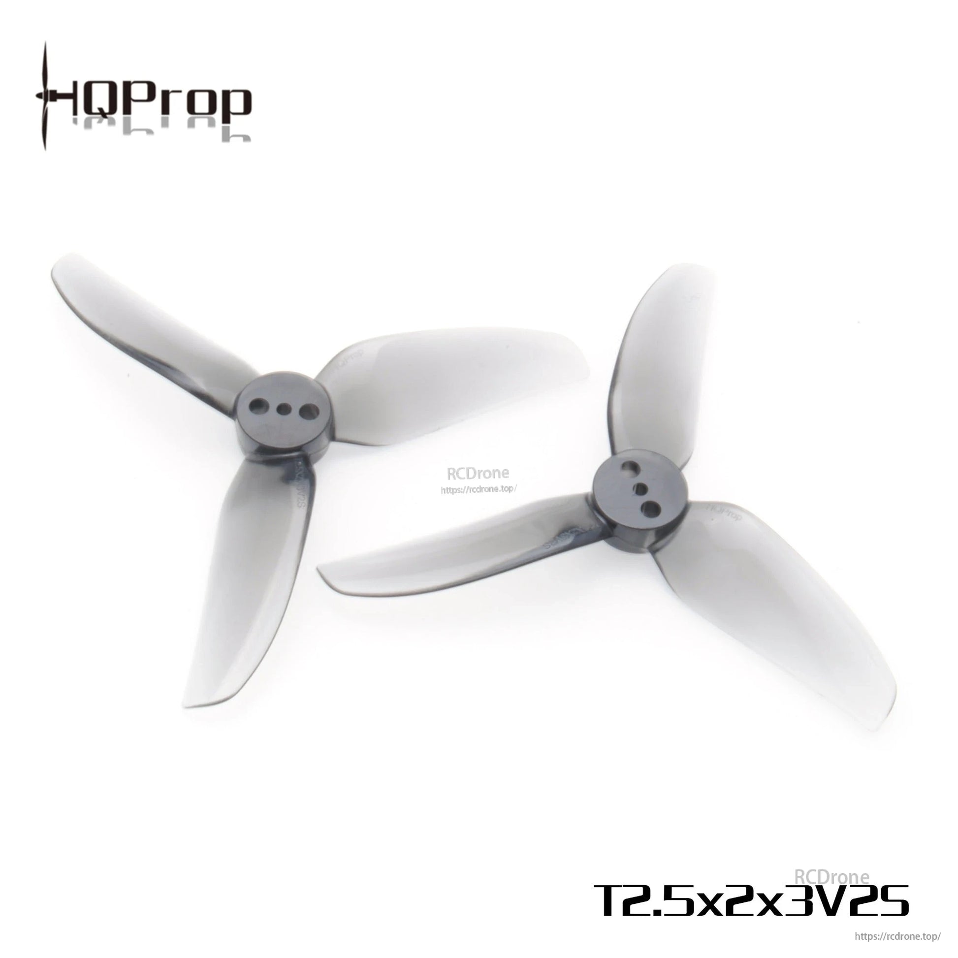 Pair of smoke-gray tri-blade propellers on white background, hub and blade shape view