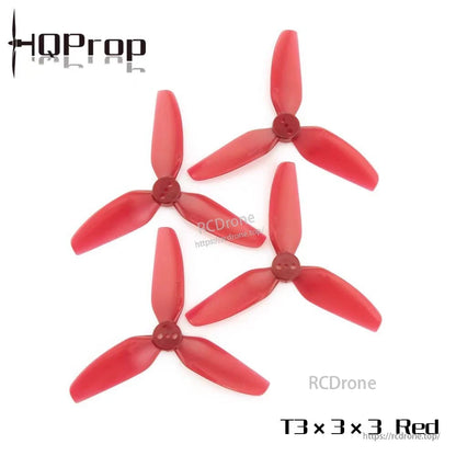 Set of four red HQProp T3X3X3 3-inch tri-blade FPV drone propellers with 1.5mm center holes