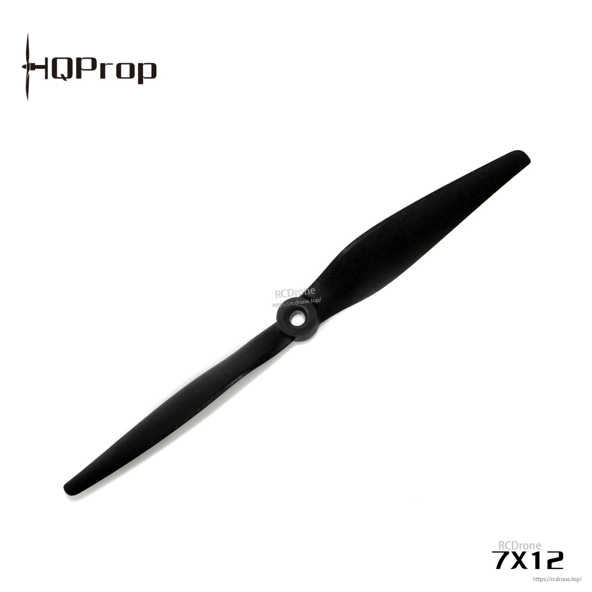 Angled top view of black 7x12 two-blade propeller with center mounting hole on white background