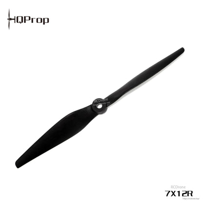 2-blade black propeller with center hub detail and printed 7x12R marking on white background