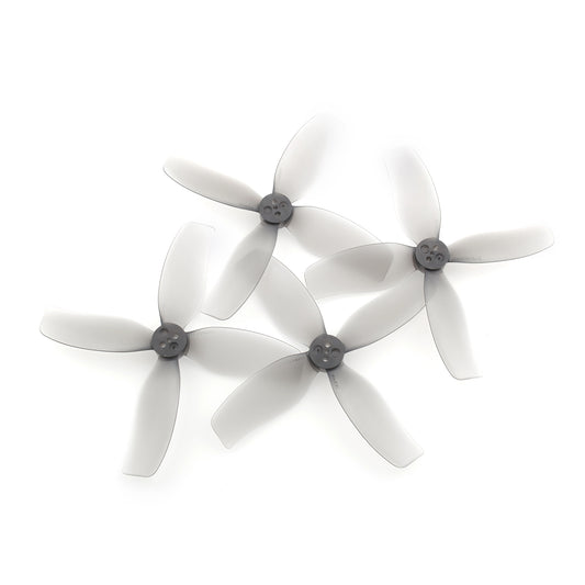 HQ Prop DT90MMx4 90MM 4-Blade FPV Drone Propeller, Set of four HQ Prop 90mm 4-blade FPV drone propellers with translucent gray blades and dark hubs