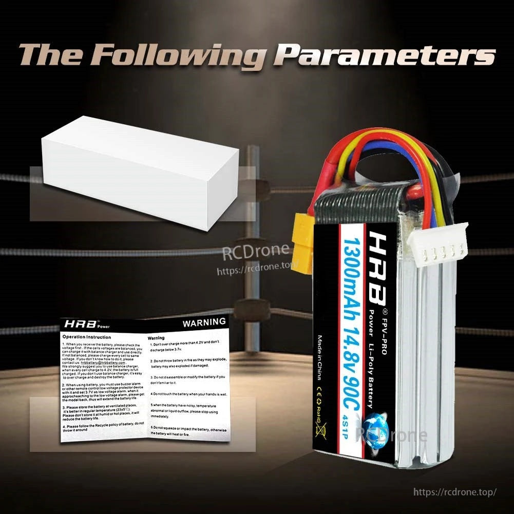 HRB FPV-PRO LiPo battery packaging contents: battery pack, white retail box, and safety/warning leaflet