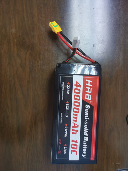 Real-life photo of HRB semi-solid LiPo pack on table with XT90 connector and balance lead attached
