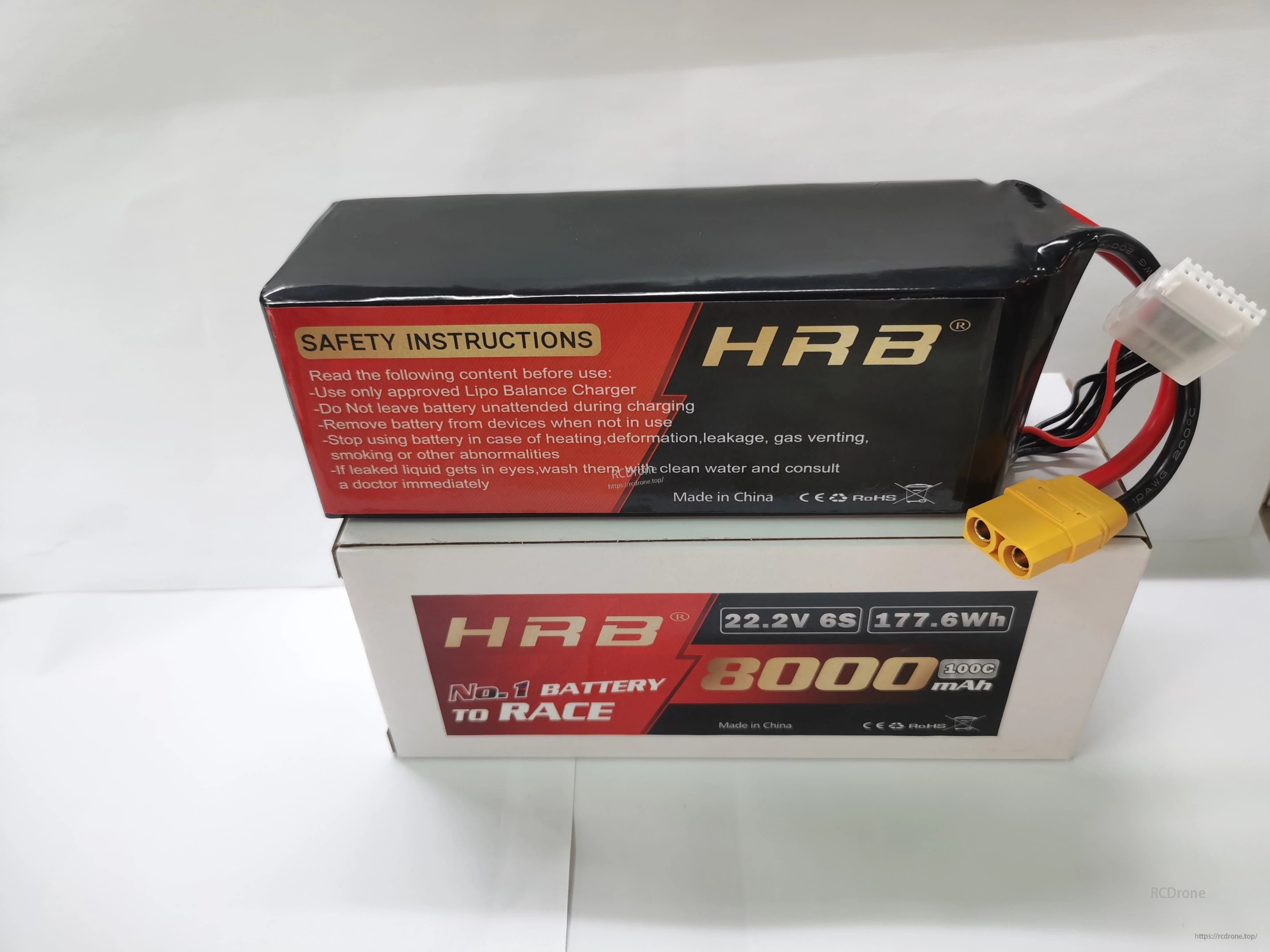 Back label with printed safety instructions on HRB 6S LiPo battery; main connector and balance lead visible