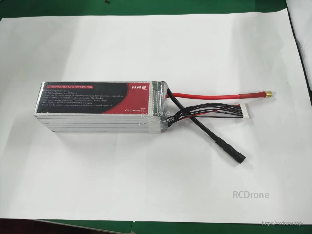 HRB 8S 5000mAh 100C LiPo battery pack with leads and balance plug, side view on white backdrop