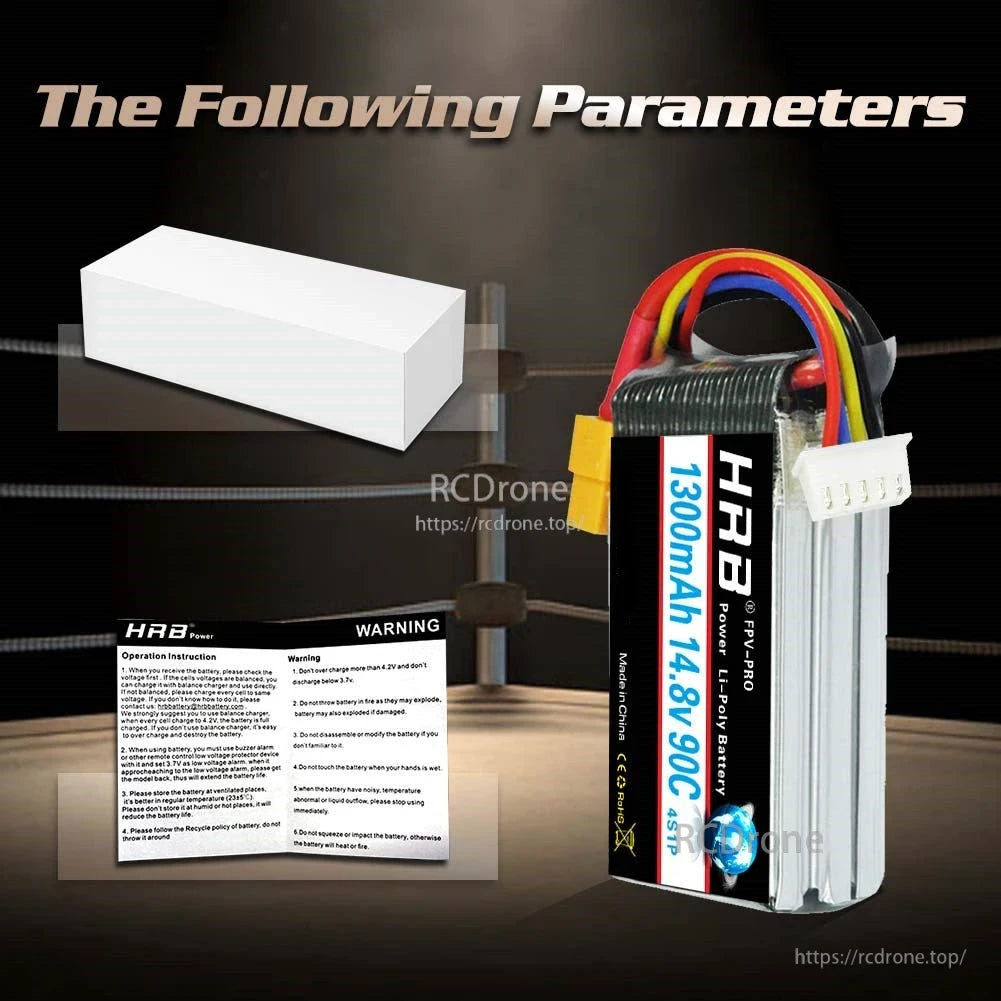 Package contents graphic with white box and warning instruction leaflet plus battery shown upright