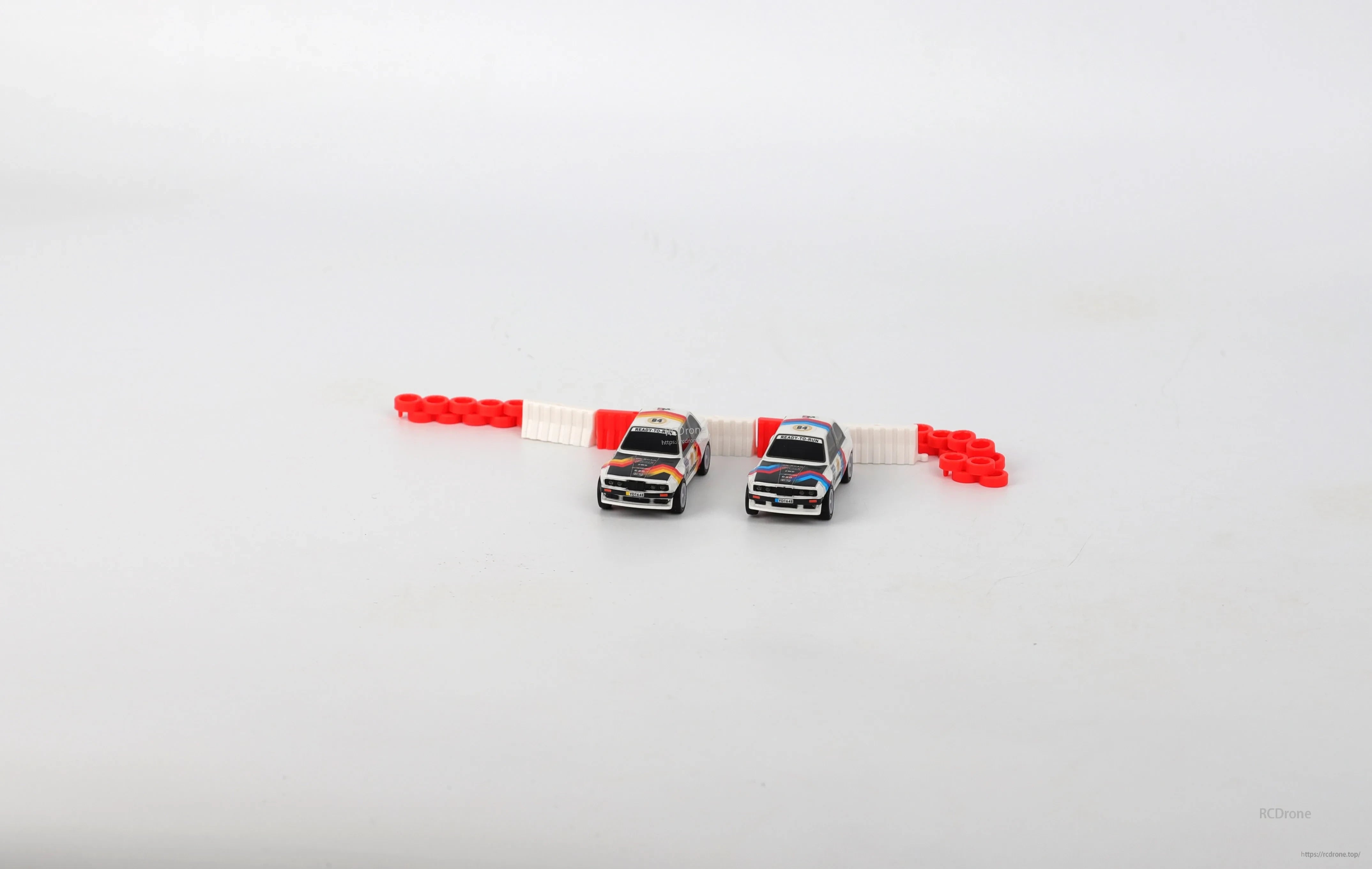 HSP TinyGear TX-8B 1/64 Rc Car, Vehicular components include metal rims and interchangeable rubber tires for improved grip and traction.